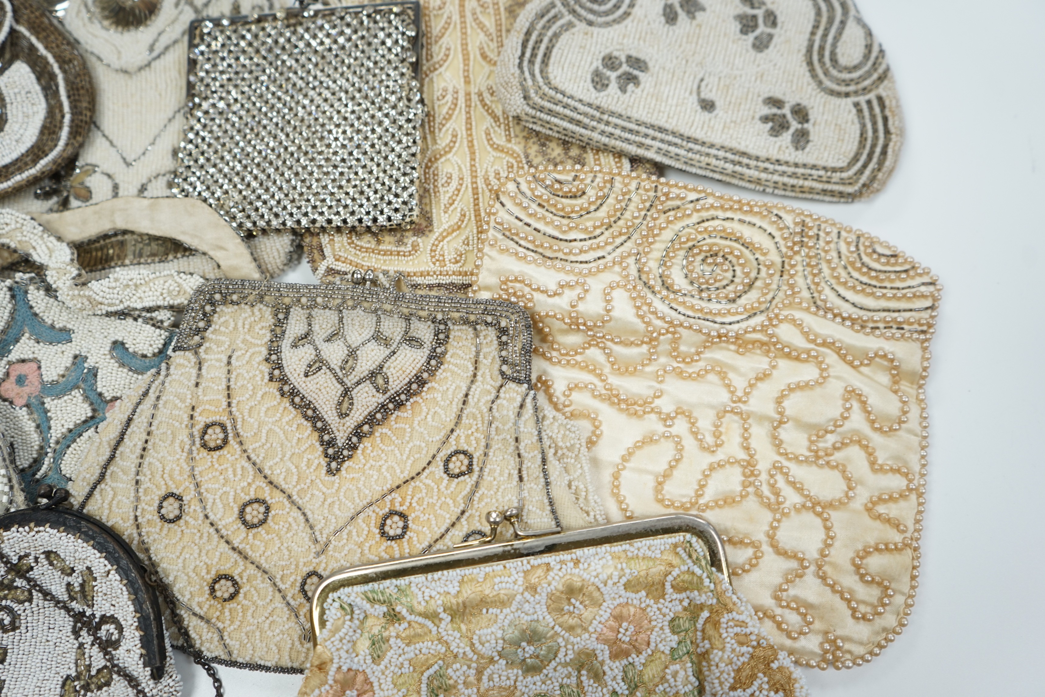 Twelve 1930’s beaded, sequin and pearl evening clutch bags and bags, some with embroidered decoration